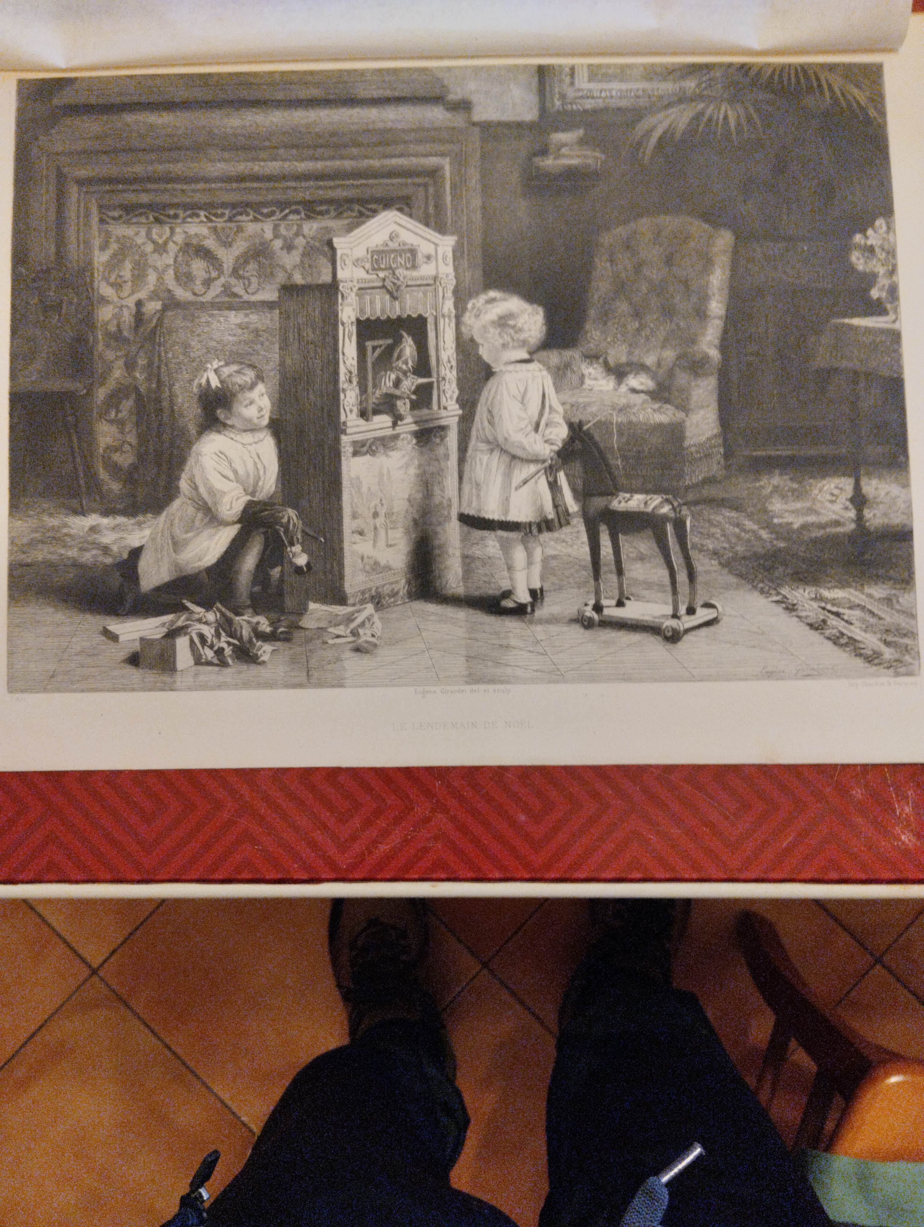 Scena domestica con bambini e teatro dei burattini